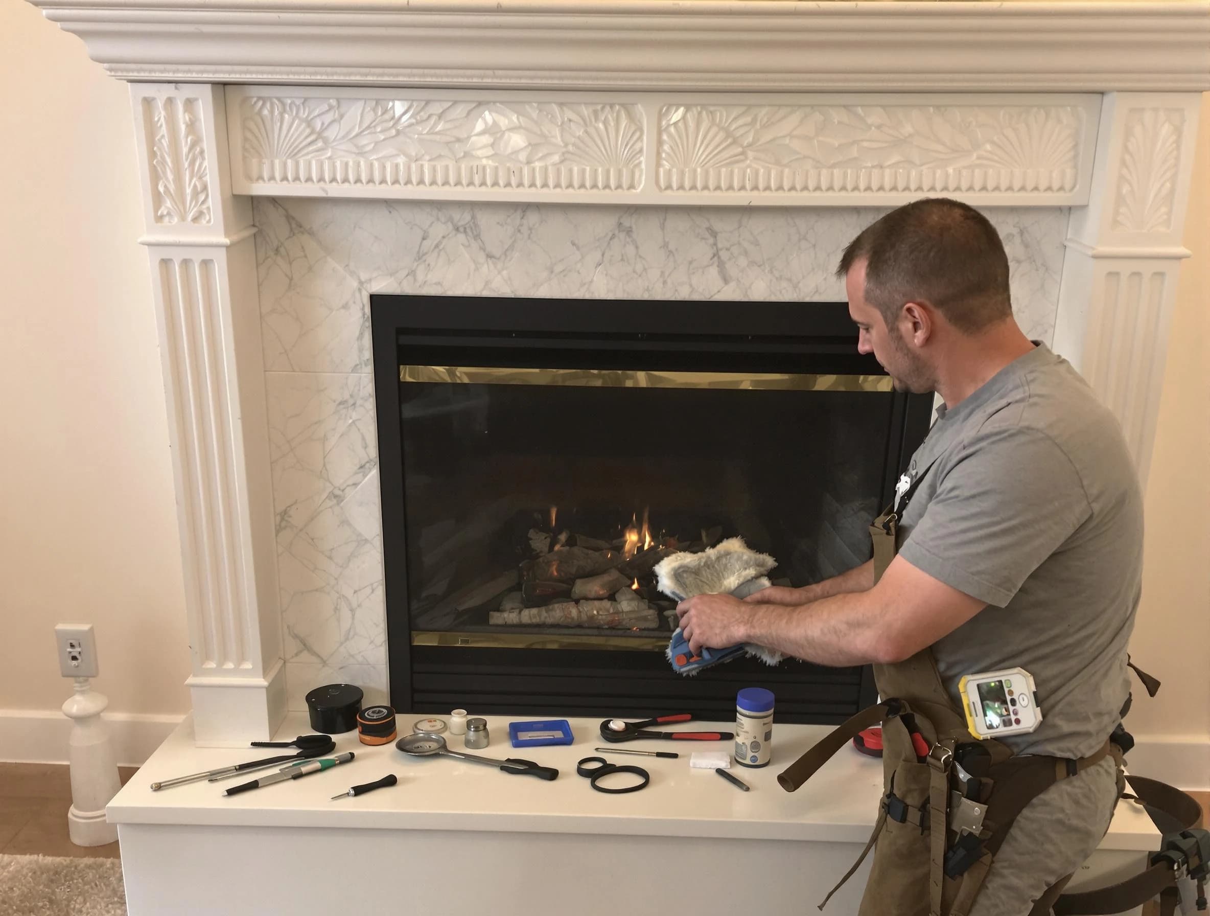 Newark Chimney Sweep performing fireplace maintenance in Newark, NJ